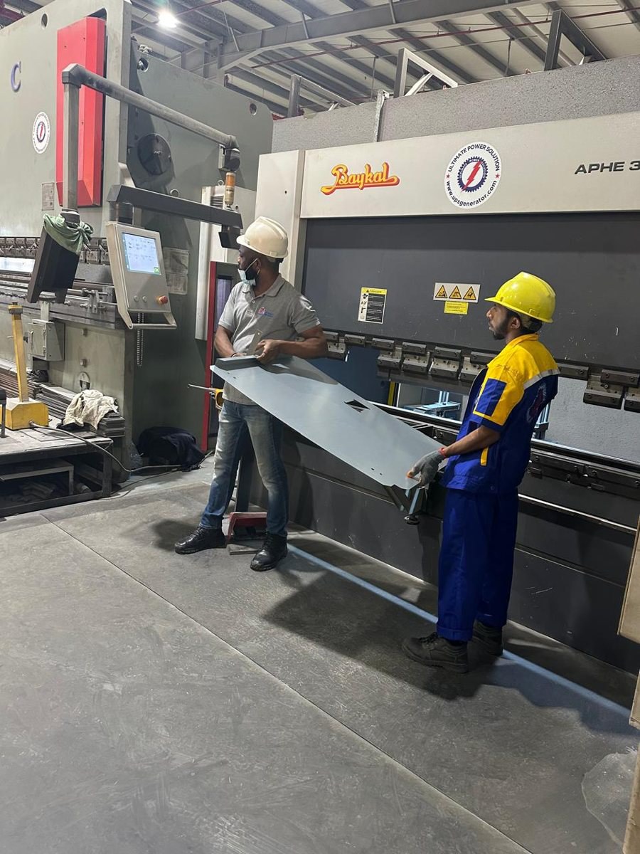 Positioning a canopy panel for bending on the Baykal press brake