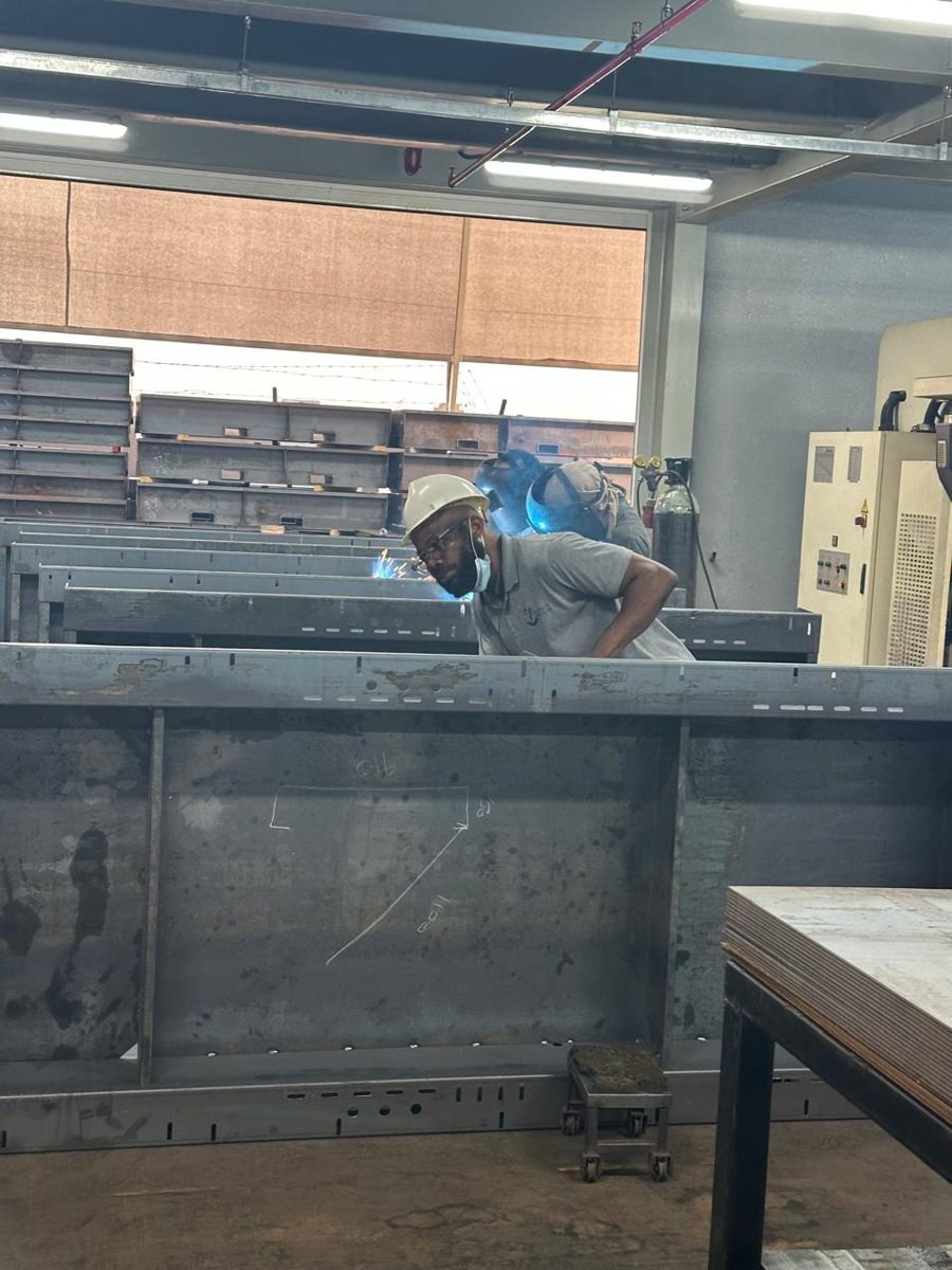 Inspecting a base-frame weld joint in the welding bay